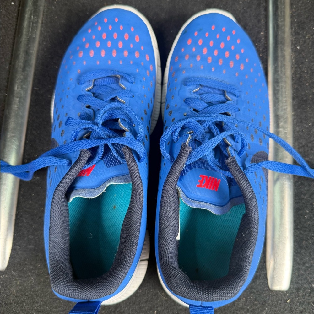 Nike Kids Blue Sneakers with Red Logo Accents